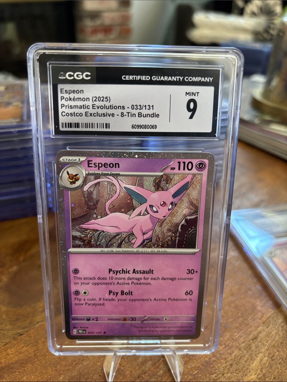 CGC 9 Espeon Holo Costco Exclusive 8 Tin Pokemon Prismatic Evolutions 033/131